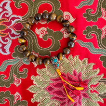 Load image into Gallery viewer, Tiger Eye with Tibetan Guru bead -wrist mala