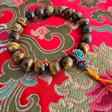 Load image into Gallery viewer, Tiger Eye with Tibetan Guru bead -wrist mala