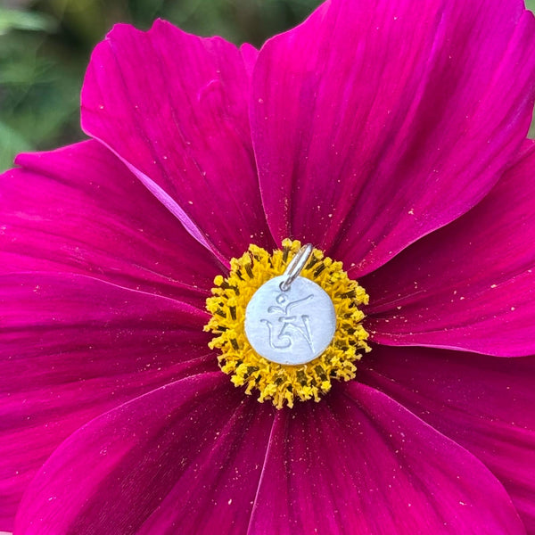 om mantra silver pendant
